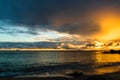 Travel photo of St. BarthÃ¢â¬â¢s Island St. BartÃ¢â¬â¢s Island, Caribbean. View of a peaceful sunset and waves on Shell Beach Royalty Free Stock Photo